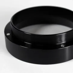 Black dosing funnel 58 mm for precise coffee dosing.