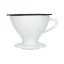 White ceramic Hario W60-02 coffee dripper for pour-over brewing. White ceramic Hario W60-02 coffee dripper for pour-over brewing.