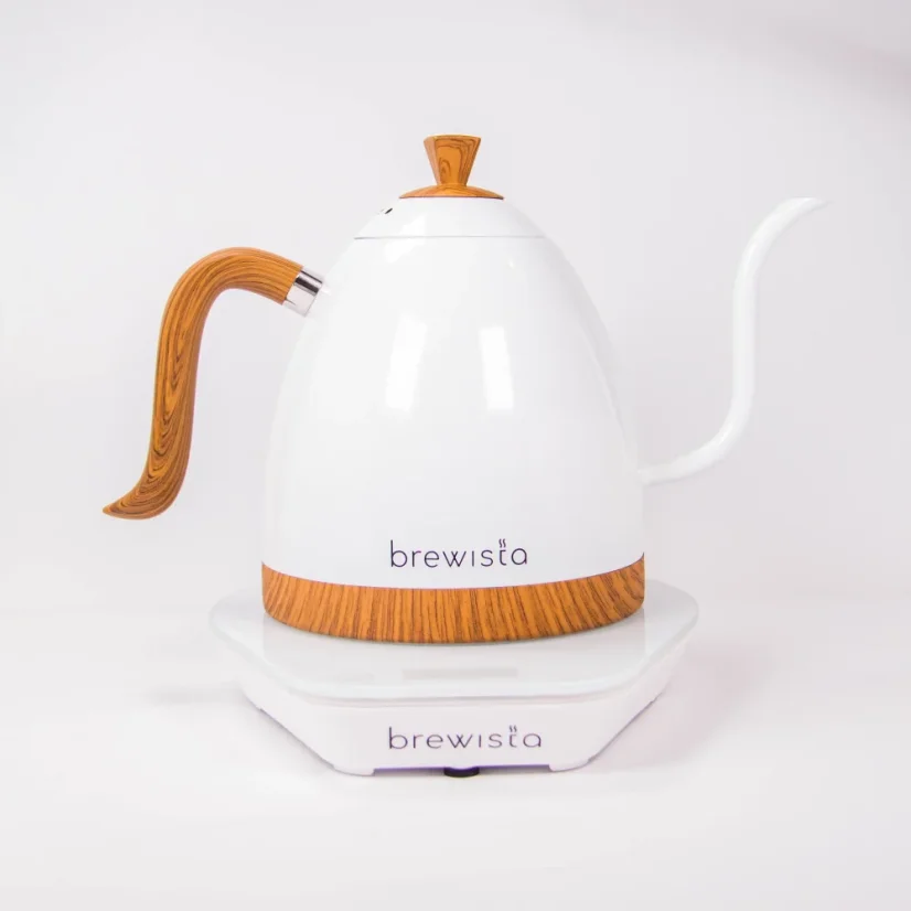Gooseneck electric kettle by Brewista in white with wooden details.