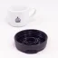 Deckel des KeepCup Kit auf weißem Hintergrund mit einer Tasse Kaffee.