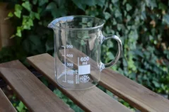 Low glass mug with handle, 600 ml capacity for outdoor seating