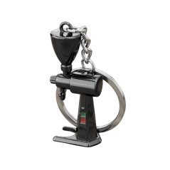 A black coffee grinder is a stylish keychain, perfect for coffee enthusiasts.