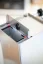 Open water tank for Mara espresso machine.