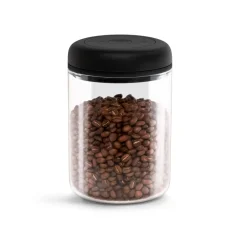 Transparent coffee and tea canister with a capacity of 1200 ml and a black lid by Fellow Atmos.