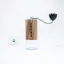 Manual coffee grinder Comandante C40 MK4 Nitro Virginia Walnut with adjustable grind size.