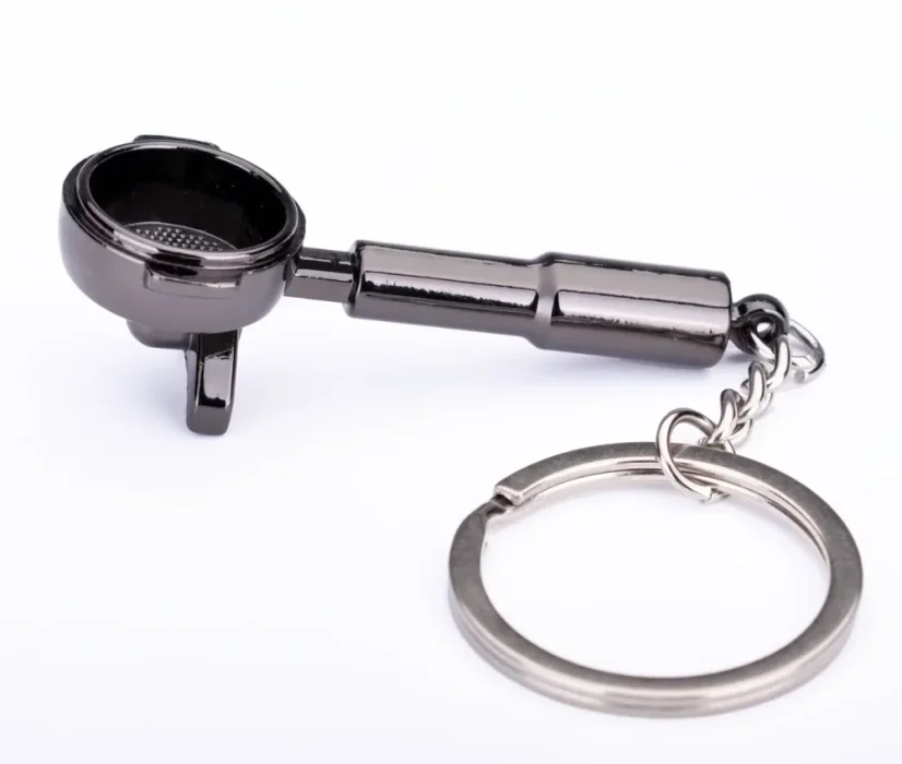 Mini porte-filtre noir en tant que porte-clés.