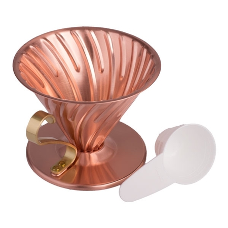 Hario V60-02 copper dripper with white measuring cup for your coffee.