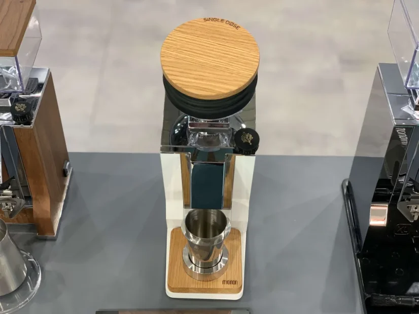 Eureka ORO Mignon Single Dose espresso coffee grinder in white, perfect for office use.