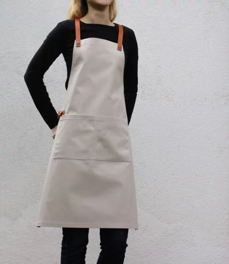 Beige barista apron with pockets, front view