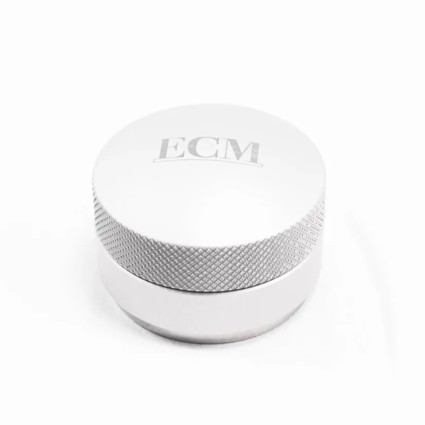 Coffee tamper with a diameter of 58 mm made of steel and aluminum.