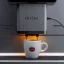 Automatic Nivona NICR 970 coffee machine with an integrated grinder for coffee beans, suitable for home use. Automatic Nivona NICR 970 coffee machine with an integrated grinder for coffee beans, suitable for home use.