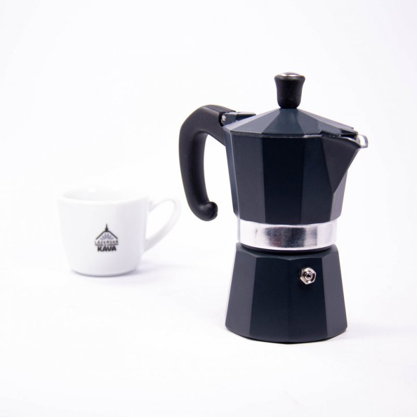 Forever Prestige Noblesse moka pot for 2 cups of coffee, white espresso cup in the background.